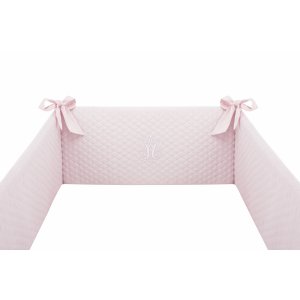 Baby pink cot bumper with emblem