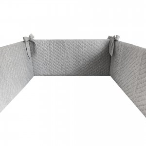Grey quilted cot bumper